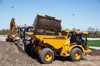 912GS Loaded By Hydr Backhoe