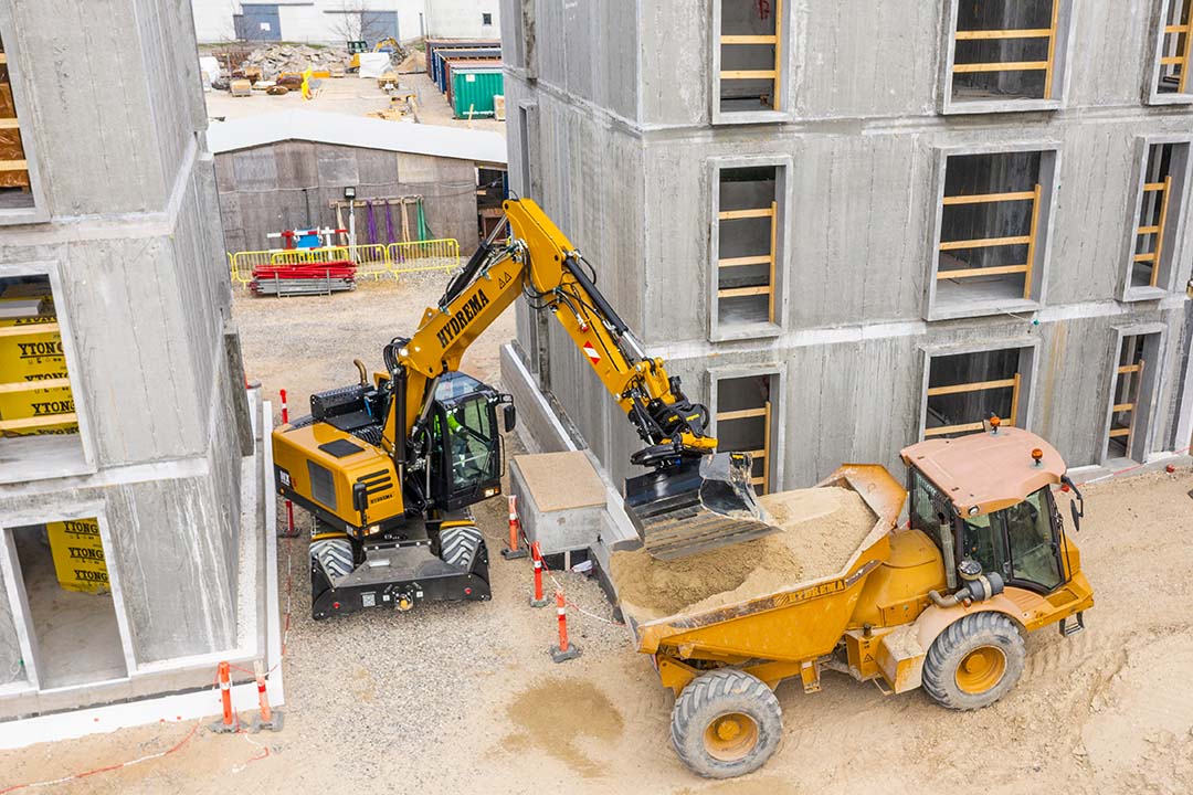 MX16G Working In Narrow Conditions Construction Site